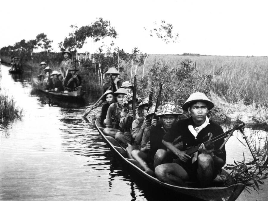 Viet Cong Canoing In The River