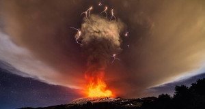 Explosions From Mount Etna's Voragine Crater Light Up Night Sky