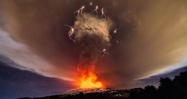 Explosions From Mount Etna's Voragine Crater Light Up Night Sky