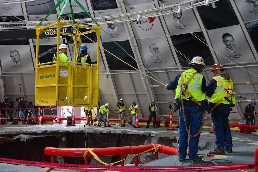 Repair Workers On Corvette Museum