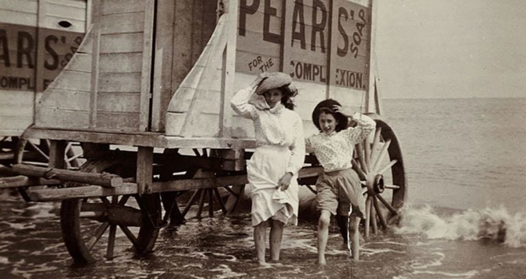 Girls Paddling Beside Bathing Machines, C 1900.