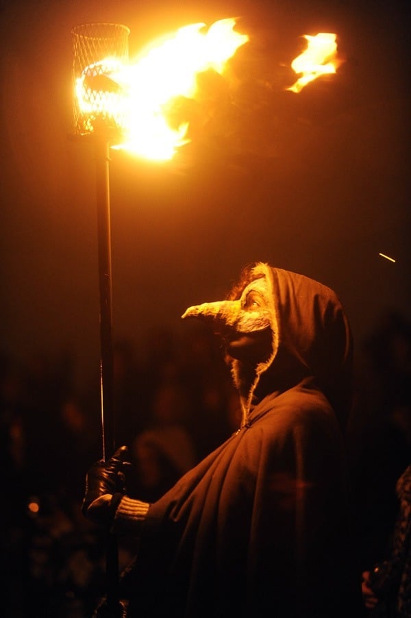 A Masked Performer Takes Part In The Bel