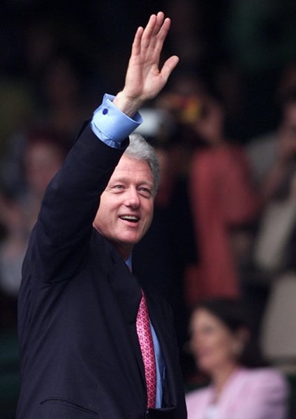 Bill Clinton Arms Raised