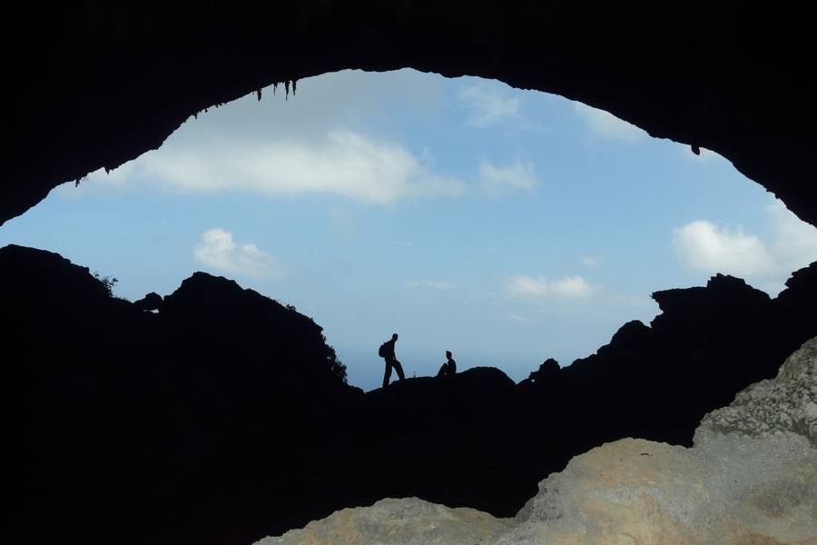 Silhouettes In Cave