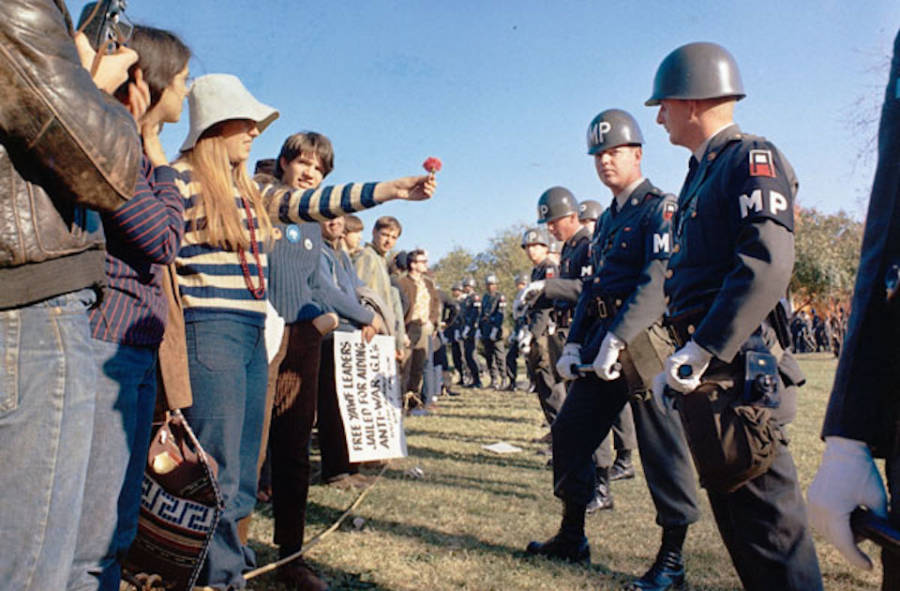 Protester Holding Flower