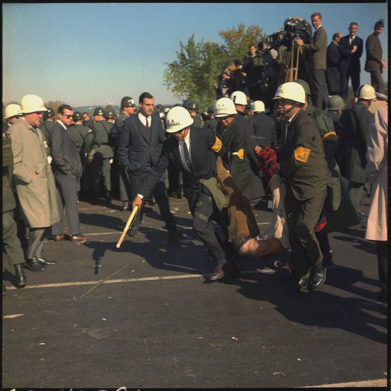 Protester Dragged Away