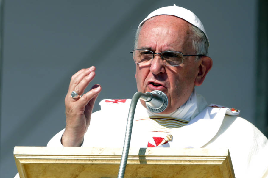 Francis Speaking At Podium