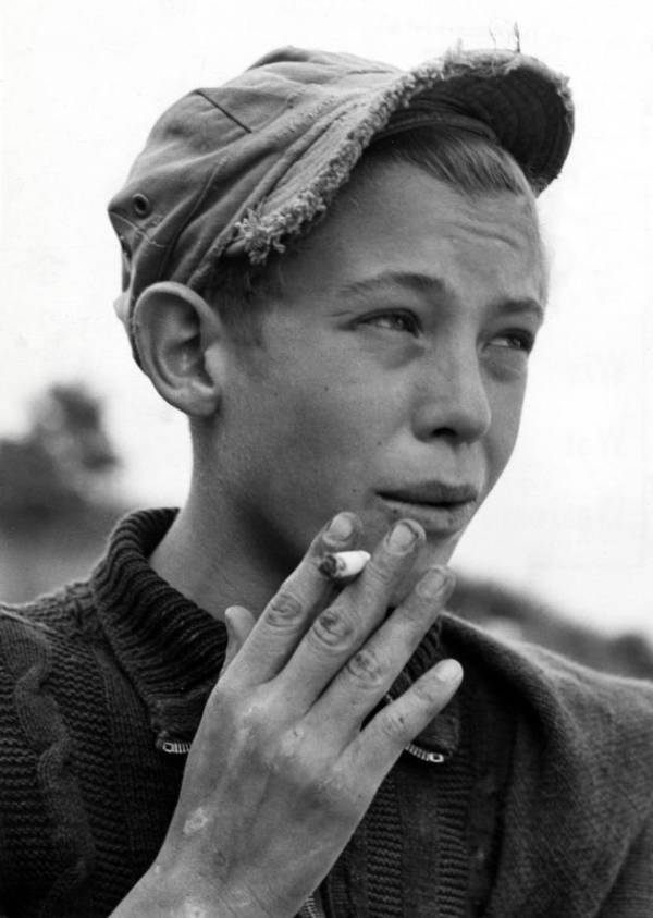 Smoking Boy At A Playground