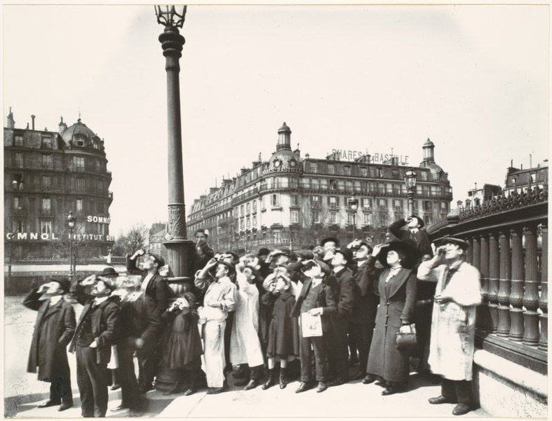 People Looking Skyward