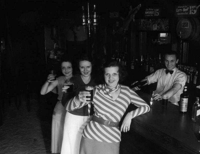 Malamute Saloon Girls Drinking