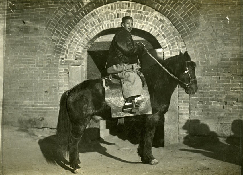 Man Riding A Pony