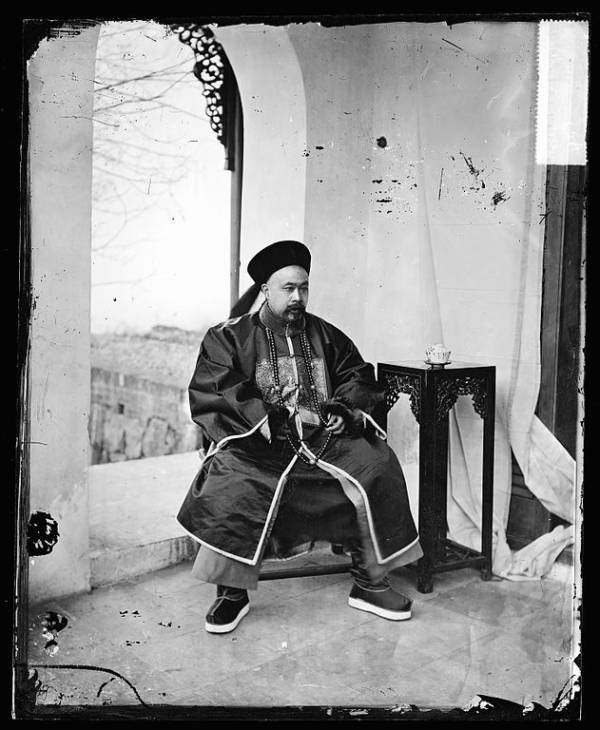 Robed Man Sitting