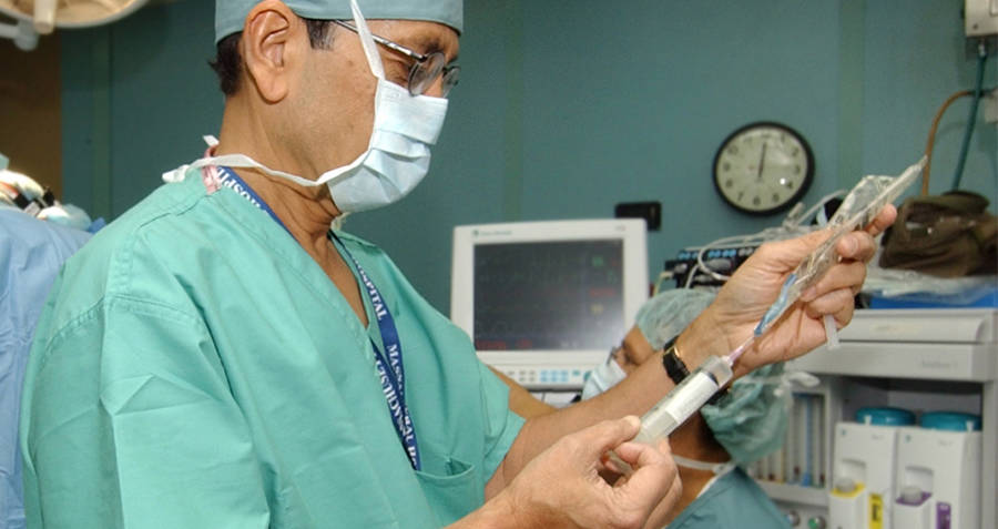 Doctor holding a syringe