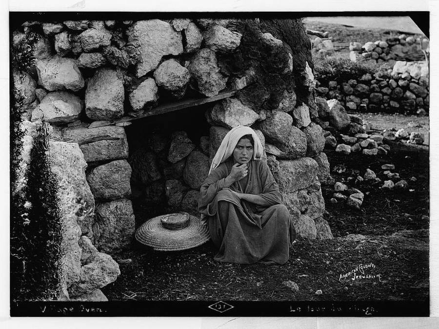 Woman At Village Oven