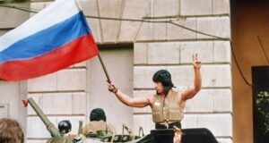 Soldier With Russian Flag Featured