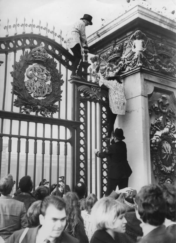 Beatlemania Fans Climb Buckingham