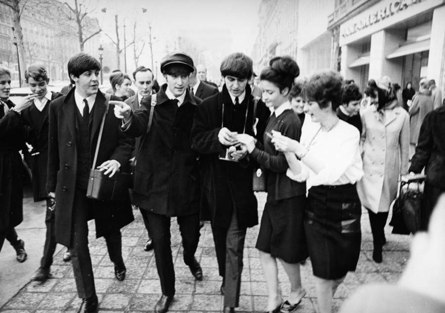 Beatles Signing Autographs