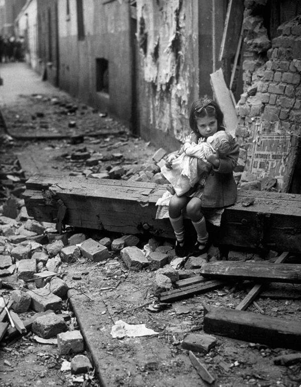 A Girl Holding A Doll