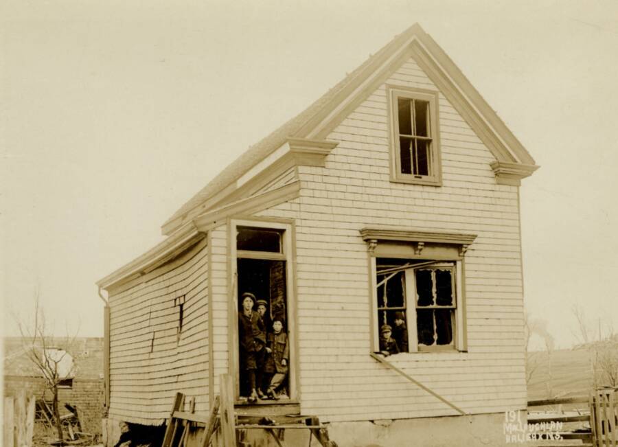 Children In A Damaged Building