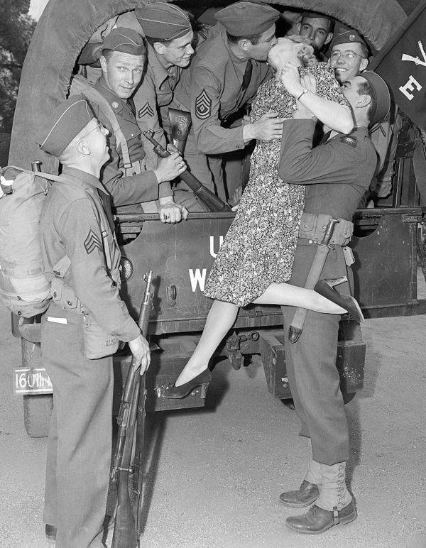 Girl Lifted Up For A Goodbye Kiss