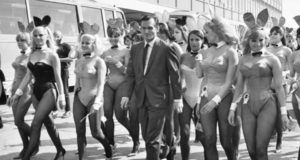 Hefner Walking With Women