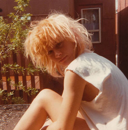 Woman With Blonde Mop