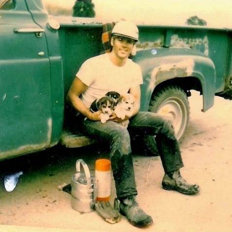 Coal Miner With Puppies