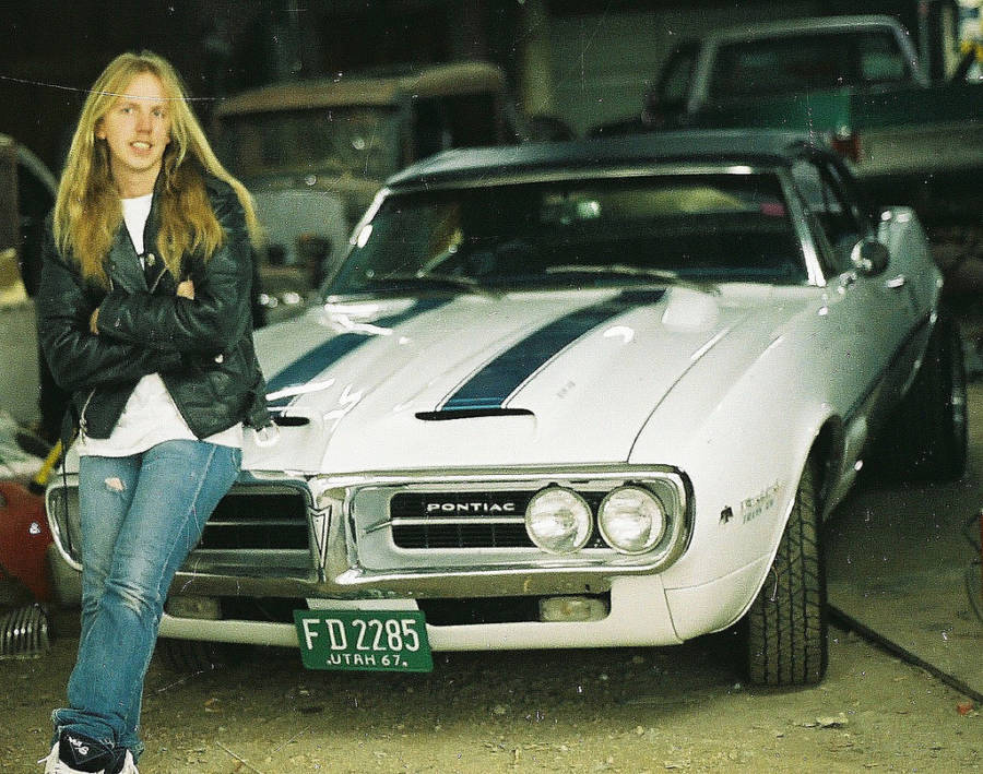 Guy Leaning On Pontiac