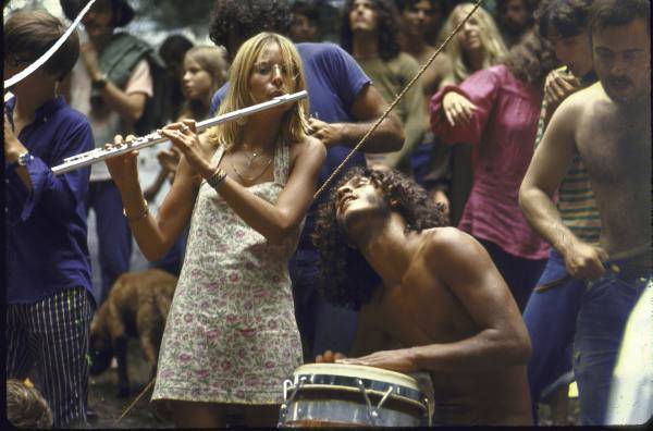 Young Hippies Playing Instruments