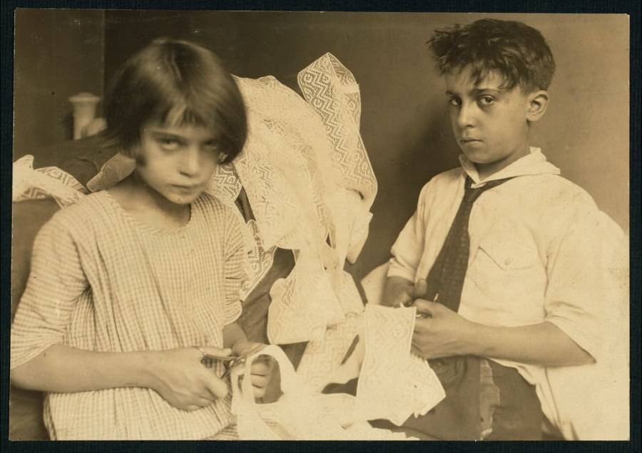 Boy And Girl Working With Lace