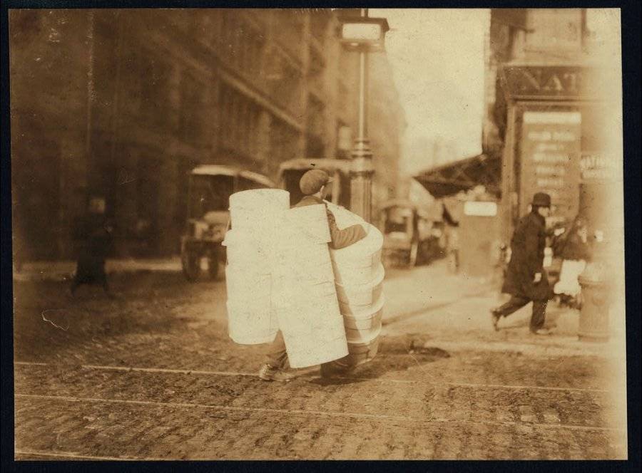 Boy Carrying Huge Bundles