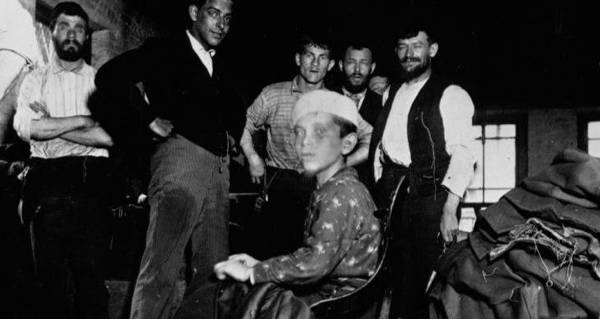 Boy Pulling Thread Onlookers