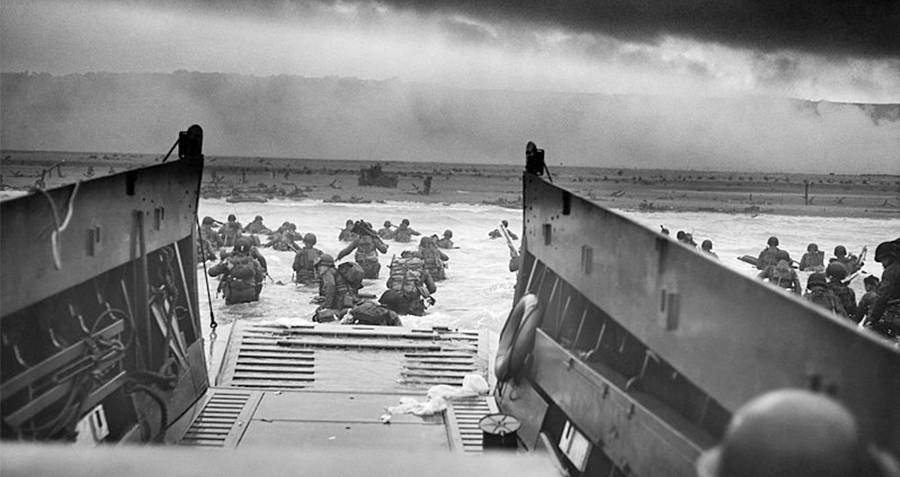 Soldiers storm beach on d-day