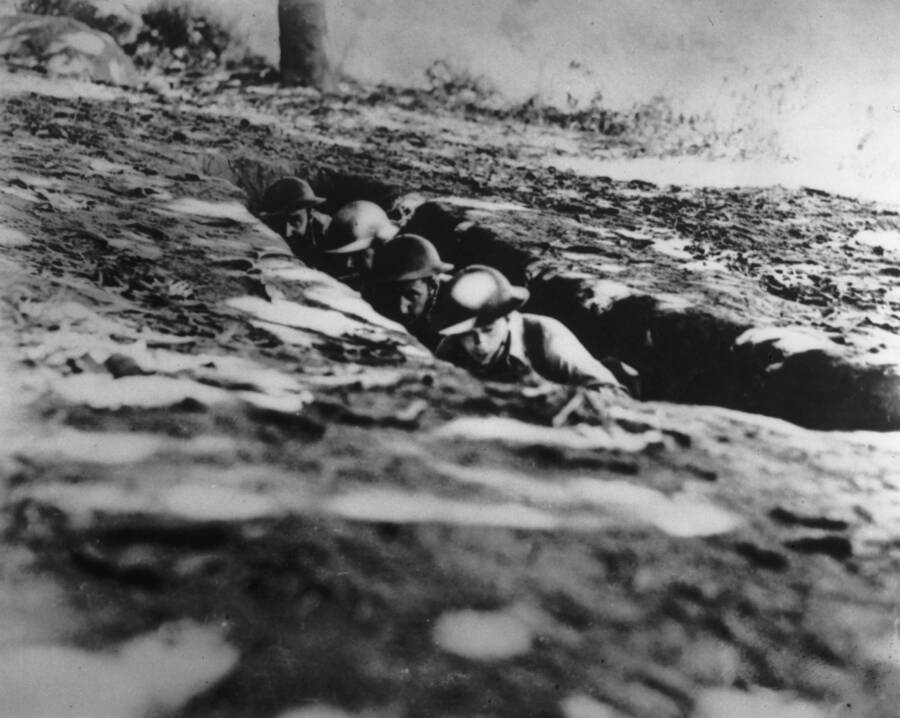 Allied Soldiers Hiding In A Foxhole