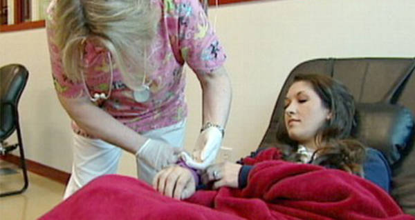 girl can only walk backwards after flu shot