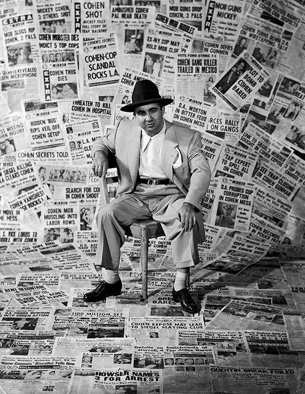 Mickey Cohen With Newspapers