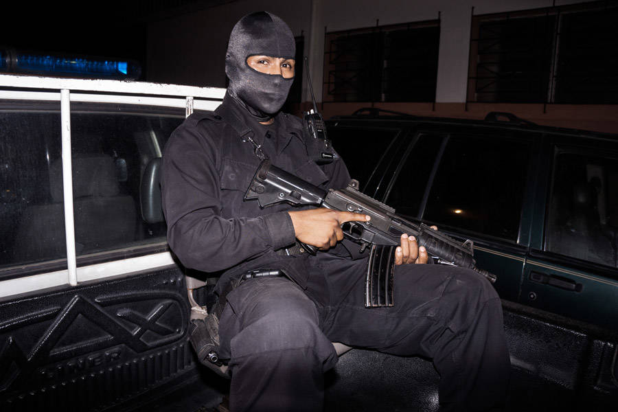 Masked Guard In El Salvador