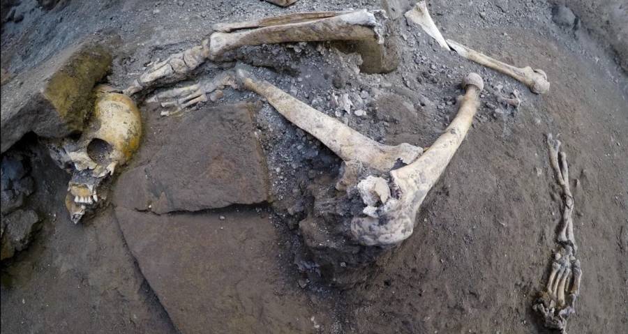 Pompeii Skeleton Under Rock