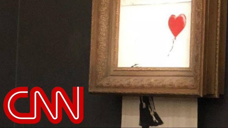 Banksy Painting Shreds Itself Immediately After Being Sold For $1.4 Million