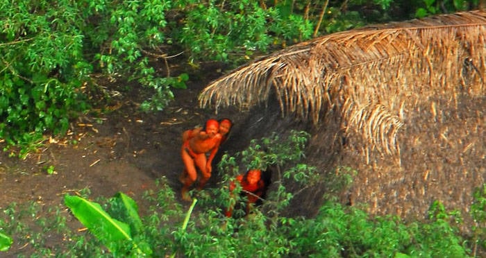 Isolated Natives Huddling Away From Drone