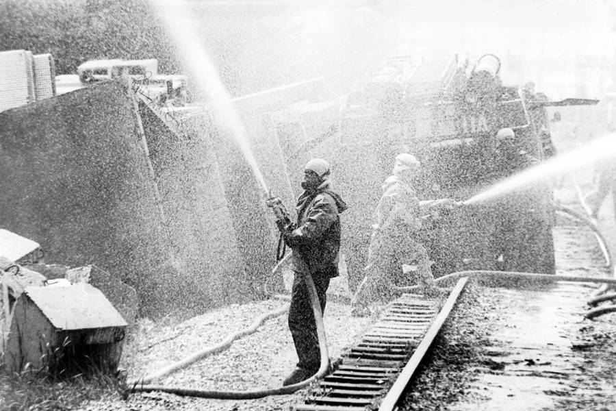 Chernobyl Workers Hosing Down Reactor