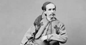 Closeup Surratt Seated Featured