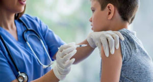 Nurse Gives Injection Boy Featured