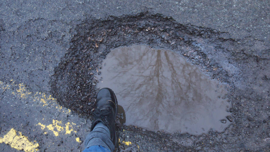 Large Pothole In Oakland California