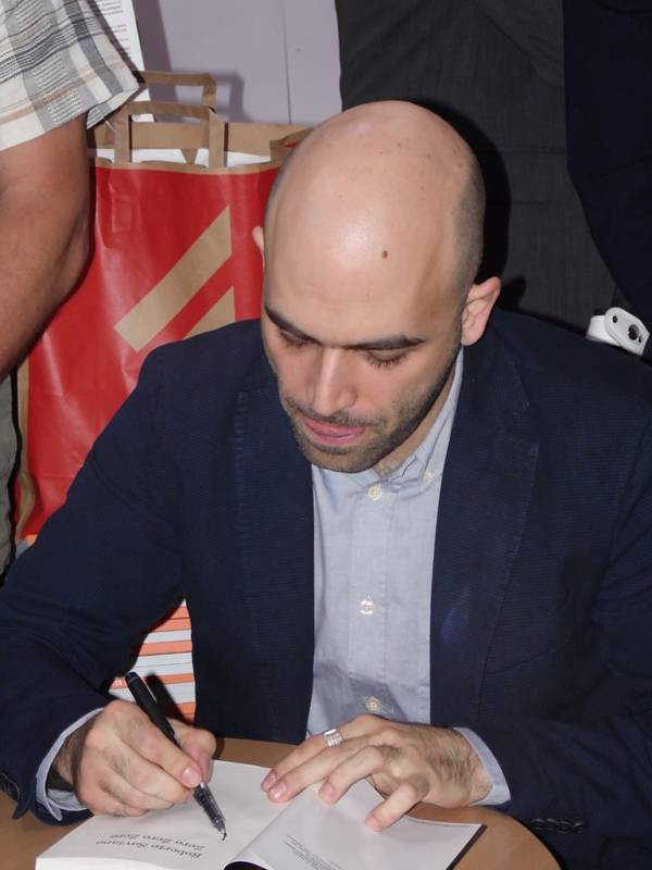 Saviano Signing A Book