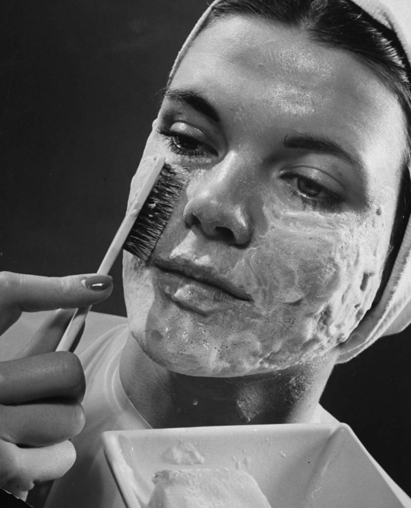 Vintage Woman Applies Cream Facial