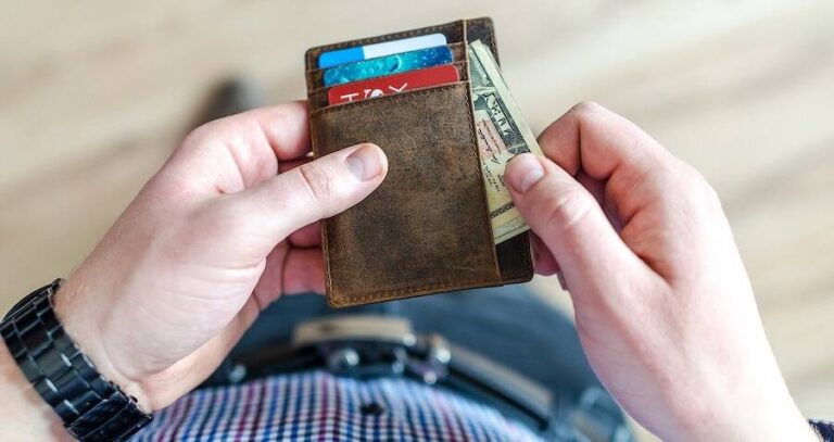 Man Holding Wallet
