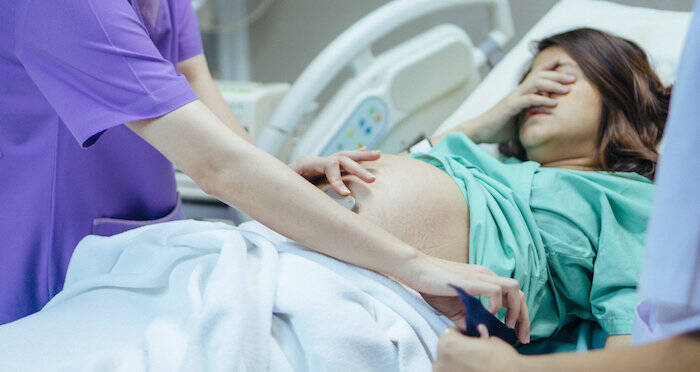 Pregnant Woman In Labor
