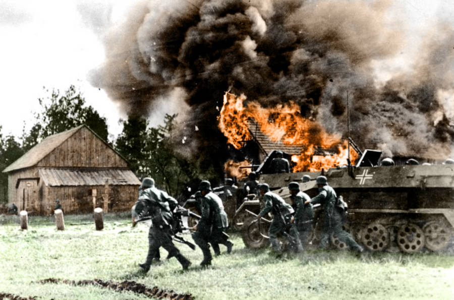 soldiers-in-front-of-a-burning-building.jpg