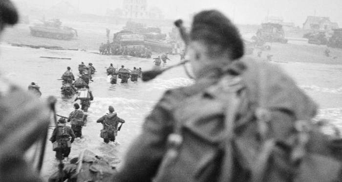 View Over Soldiers Shoulder Running Into Ocean